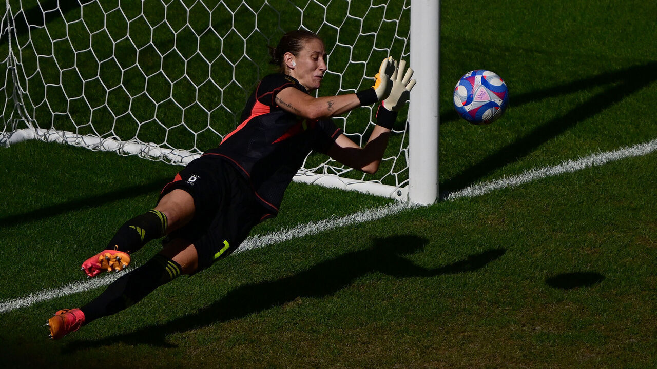 Germany's goalkeeper #12 Ann-Katrin Berger deflects the goal attempted from the penalty spot in the women's bronze medal football match between Spain and Germany during the Paris 2024 Olympic Games at the Lyon Stadium in Lyon on August 9, 2024.