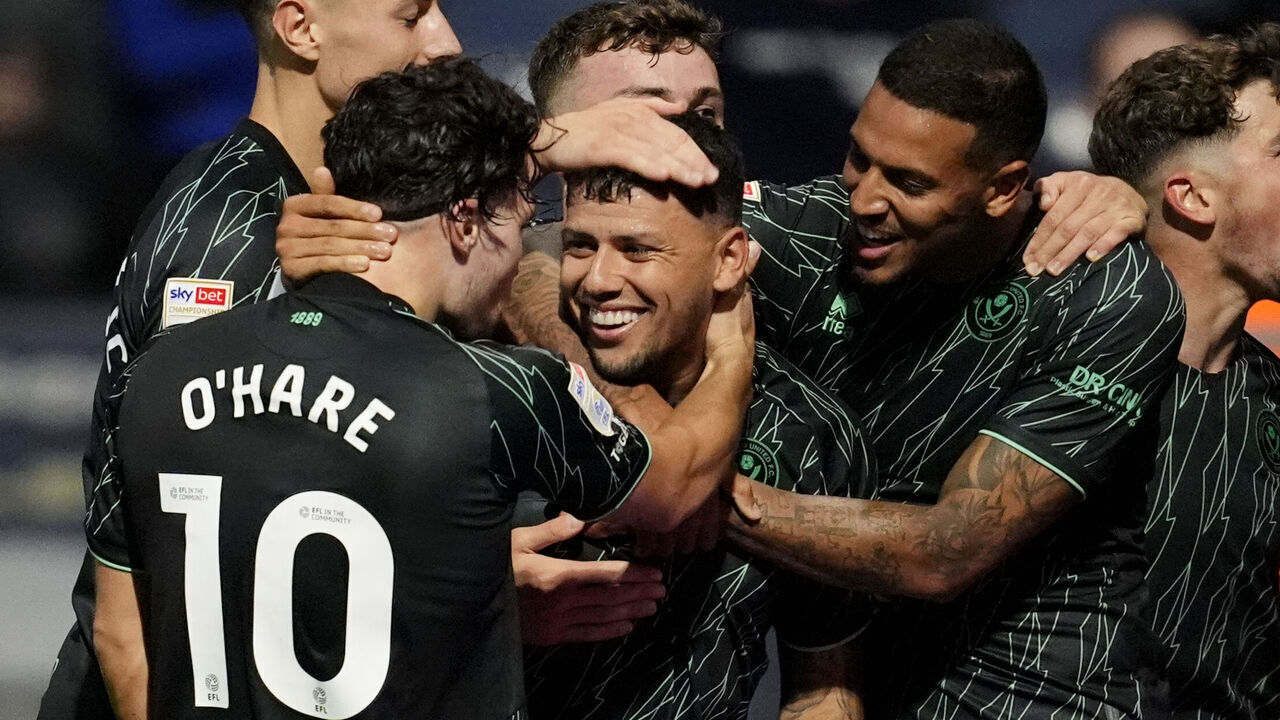 Sheffield United's Gustavo Hamer celebrates scoring their side's second goal of the game with is teammates during the Sky Bet Championship match at Deepdale, Preston. Picture date: Friday August 9, 2024.