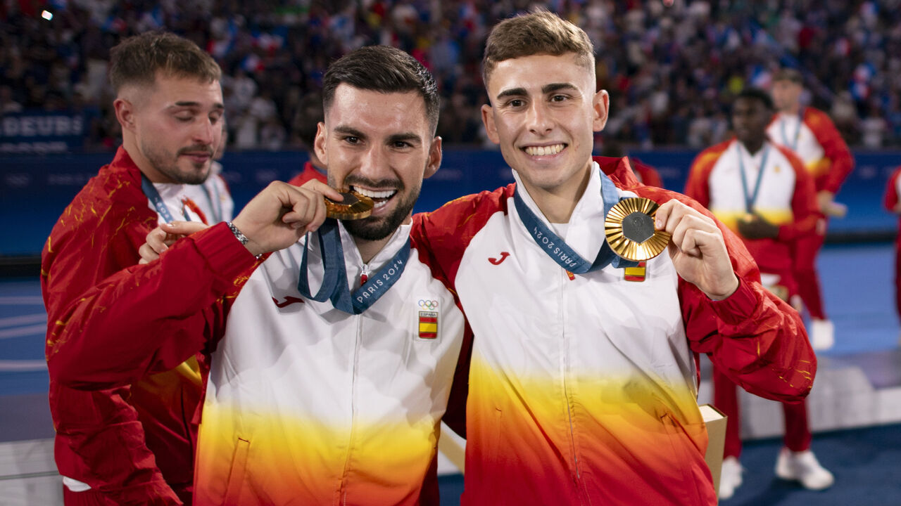PARIS, FRANCE - AUGUST 9: Alex Baena (L) and Fermin Lopez of Spain (R) celebrate winning the Gold Medal for the Men's Football final match between France and Spain during the Olympic Games Paris 2024 at Parc des Princes on August 9, 2024 in Paris, France.