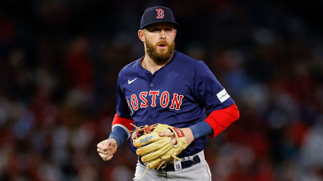 ANAHEIM, CALIFORNIA - APRIL 5: Trevor Story #10 of the Boston Red Sox jogs off the field after the third inning during an opening day game against the Los Angeles Angels at Angel Stadium of Anaheim on April 5, 2024 in Anaheim, California.
