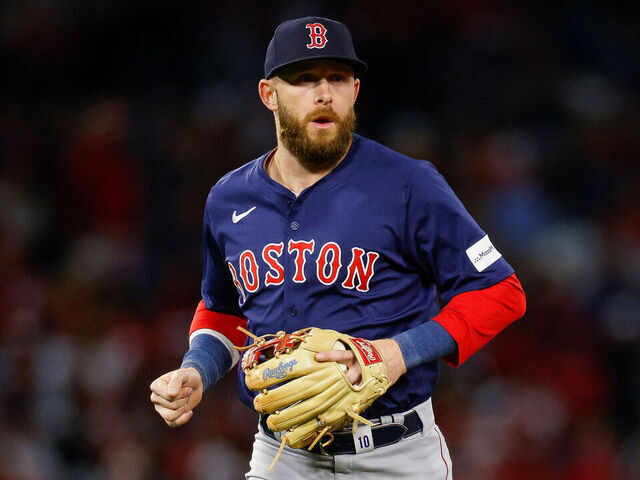 ANAHEIM, CALIFORNIA - APRIL 5: Trevor Story #10 of the Boston Red Sox jogs off the field after the third inning during an opening day game against the Los Angeles Angels at Angel Stadium of Anaheim on April 5, 2024 in Anaheim, California.