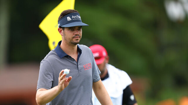 GREENSBORO, NORTH CAROLINA - AUGUST 09: Beau Hossler of the United States acknowledges the crowd on the 16th green during the first round of the Wyndham Championship at Sedgefield Country Club on August 09, 2024 in Greensboro, North Carolina.