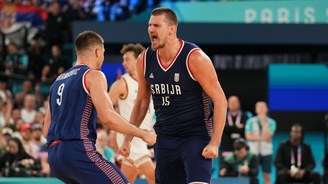 PARIS, FRANCE - AUGUST 10: Nikola Jokic #15 of the Serbian Men's National Team celebrates during the game against Team Germany during the Men's Bronze Medal Game on August 10, 2024 at the AccorHotels Arena in Paris, France. NOTE TO USER: User expressly acknowledges and agrees that, by downloading and/or using this photograph, user is consenting to the terms and conditions of the Getty Images License Agreement. Mandatory Copyright Notice: Copyright 2024 NBAE