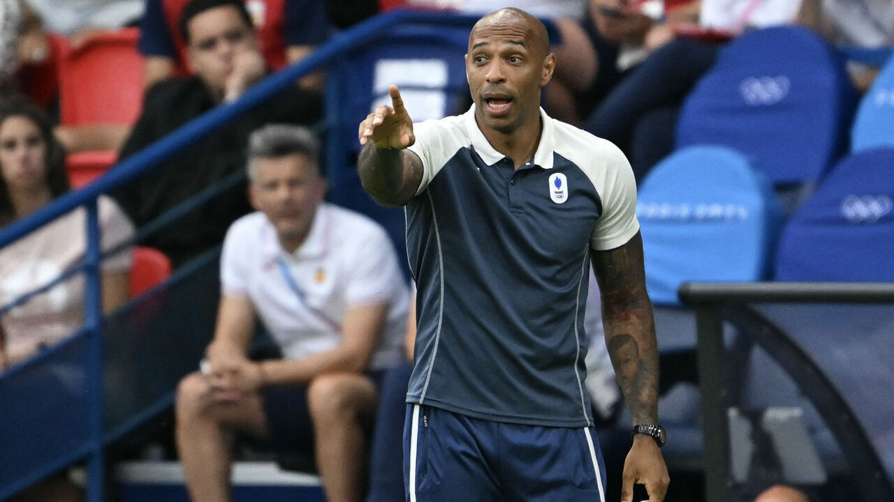 France's coach Thierry Henry gives instructions to players in the men's gold medal final football match between France and Spain during the Paris 2024 Olympic Games at the Parc des Princes in Paris on August 9, 2024.