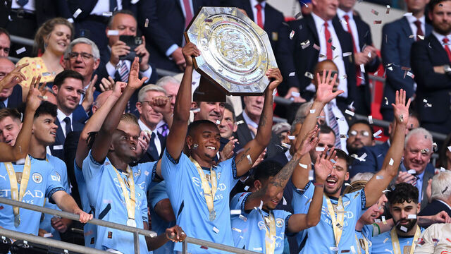 LONDON, ENGLAND - AUGUST 10: Manuel Akanji of Manchester City lifts the FA Community Shield Trophy after their team’s victory during the 2024 FA Community Shield match between Manchester United and Manchester City at Wembley Stadium on August 10, 2024 in London, England.