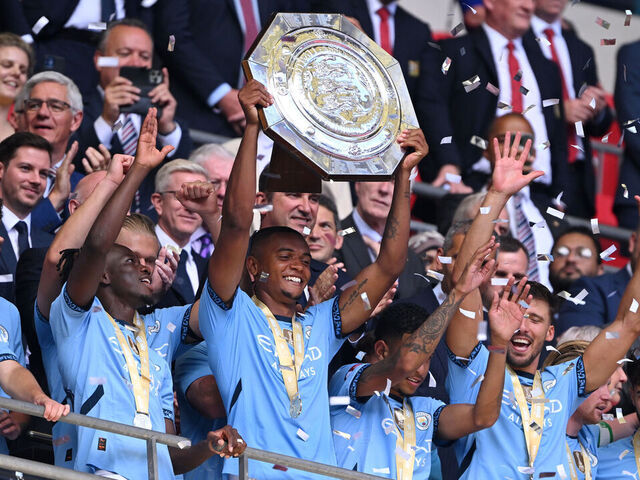 LONDON, ENGLAND - AUGUST 10: Manuel Akanji of Manchester City lifts the FA Community Shield Trophy after their team’s victory during the 2024 FA Community Shield match between Manchester United and Manchester City at Wembley Stadium on August 10, 2024 in London, England.