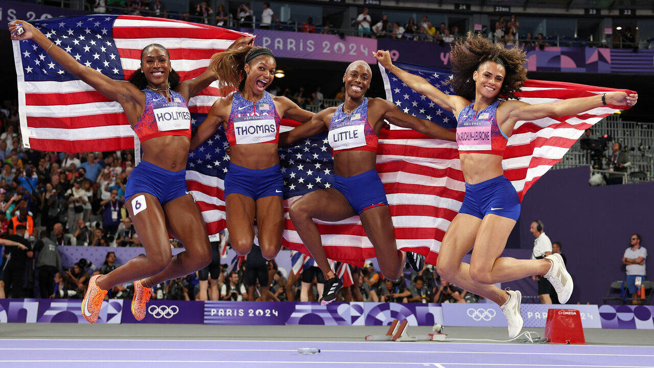 PARIS, FRANCE - AUGUST 10: Shamier Little, Sydney McLaughlin-Levrone, Gabrielle Thomas and Alexis Holmes of Team United States celebrat winning the Gold medal in the Women's 4 x 400m Relay Final on day fifteen of the Olympic Games Paris 2024 at Stade de France on August 10, 2024 in Paris, France.
