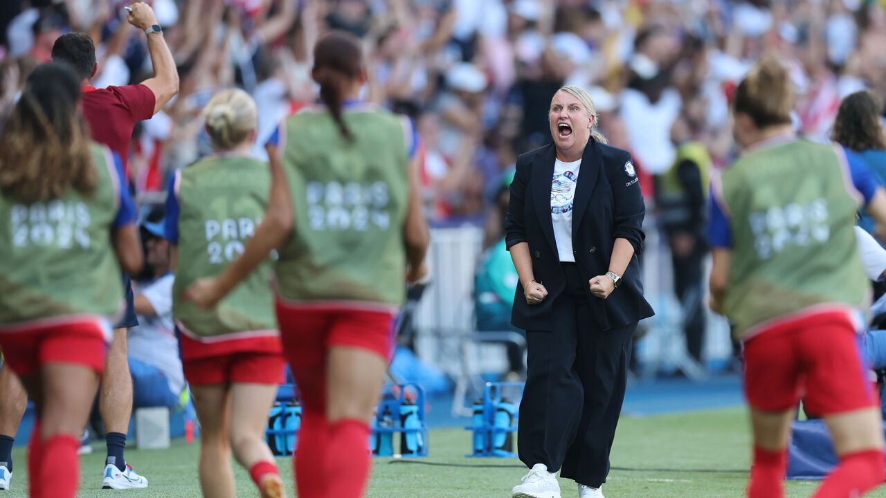 PARIS, FRANCE - AUGUST 10: Emma Hayes, Head Coach of Team United States celebrates after Mallory Swanson #9 of Team United States (not pictured) scores her team's first goal during the Women's Gold Medal match between Brazil and United States of America during the Olympic Games Paris 2024 at Parc des Princes on August 10, 2024 in Paris, France.