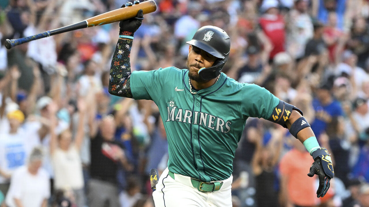 SEATTLE, WASHINGTON - JULY 20: Julio Rodriguez #44 of the Seattle Mariners tosses his bat after hitting a two-run home run during the sixth inning against the Houston Astros at T-Mobile Park on July 20, 2024 in Seattle, Washington. The Houston Astros won 4-2.