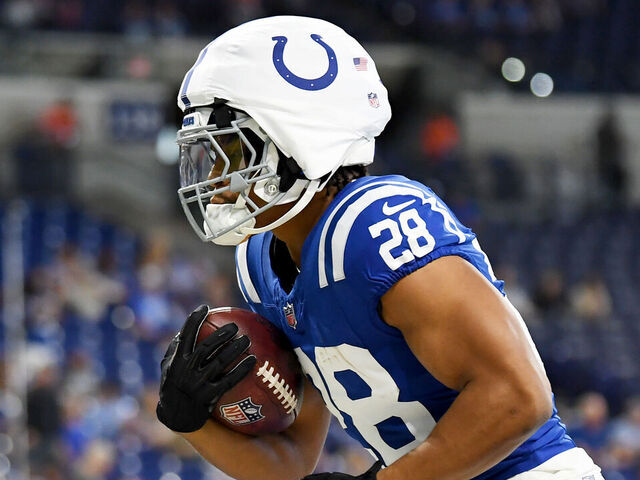 INDIANAPOLIS, INDIANA - AUGUST 11: Jonathan Taylor #28 of the Indianapolis Colts warms up before a preseason game against the Denver Broncos at Lucas Oil Stadium on August 11, 2024 in Indianapolis, Indiana.