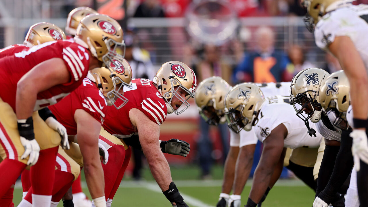 SANTA CLARA, CALIFORNIA - NOVEMBER 27: Jake Brendel #64 of the San Francisco 49ers prepares to snap the ball during the second half in the game against the New Orleans Saints at Levi's Stadium on November 27, 2022 in Santa Clara, California.