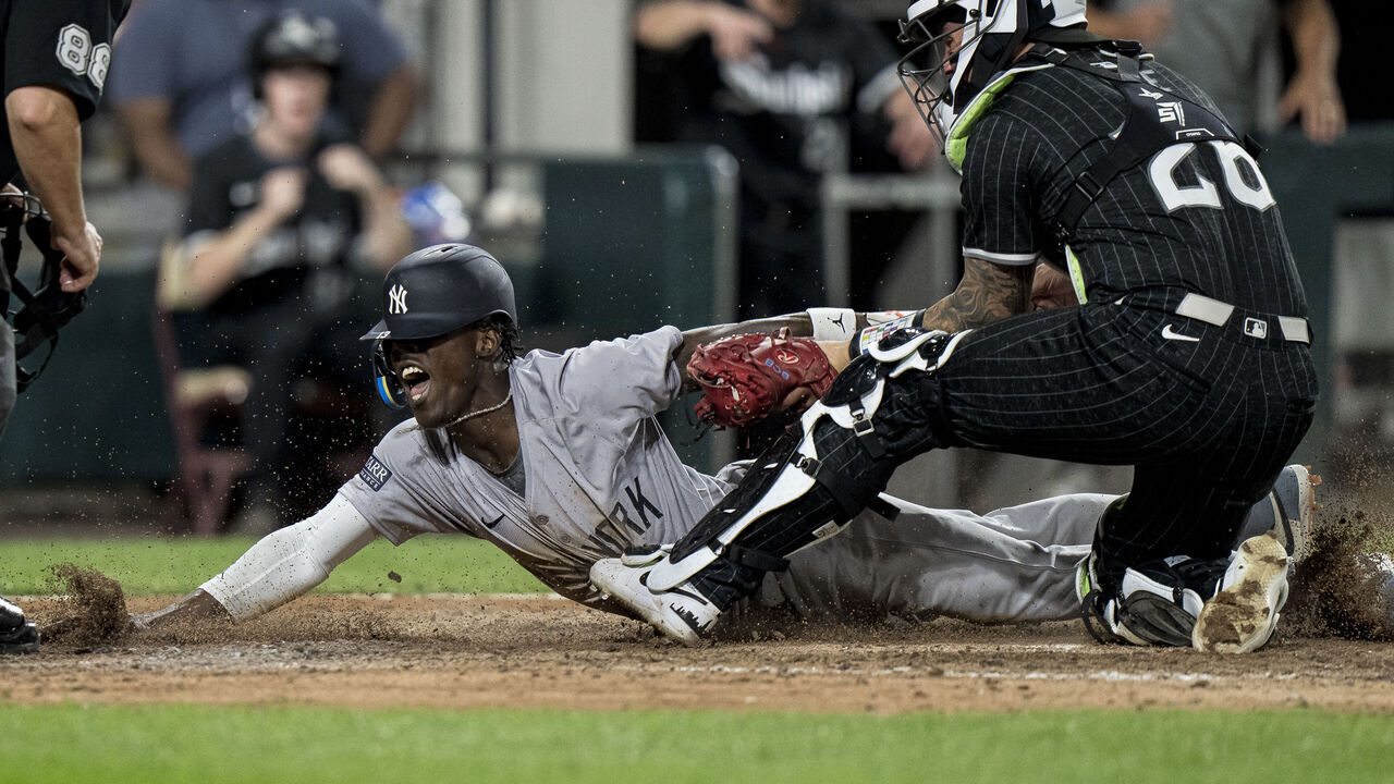 CHICAGO, IL - AUGUST 12: Jazz Chisholm #13 of the New York Yankees scores a run during a game against the Chicago White Sox at Guaranteed Rate Field on August 12, 2024 in Chicago, Illinois.