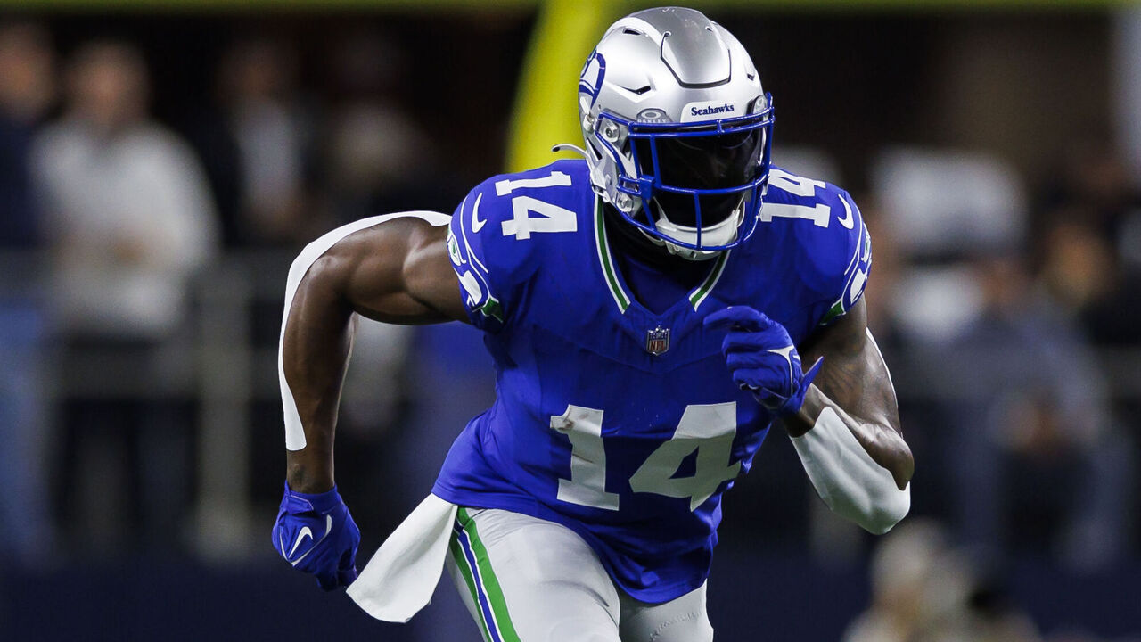 ARLINGTON, TEXAS - NOVEMBER 30: DK Metcalf #14 of the Seattle Seahawks runs a route during an NFL football game against the Dallas Cowboys at AT&T Stadium on November 30, 2023 in Arlington, Texas.