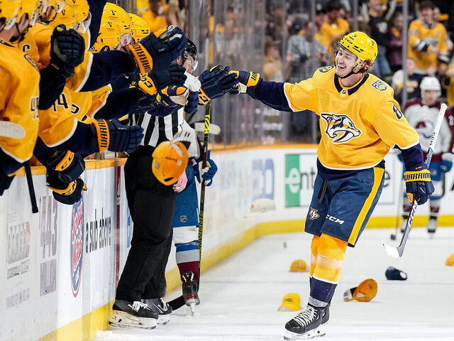 NASHVILLE, TENNESSEE - MARCH 2: Cody Glass #8 of the Nashville Predators celebrates his hat trick goal against the Colorado Avalanche during an NHL game at Bridgestone Arena on March 2, 2024 in Nashville, Tennessee.