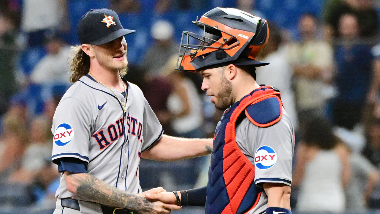 ST PETERSBURG, FLORIDA - AUGUST 13: Josh Hader #71 of the Houston Astros celebrates with Victor Caratini #17 after defeating the Tampa Bay Rays 3-1 at Tropicana Field on August 13, 2024 in St Petersburg, Florida.