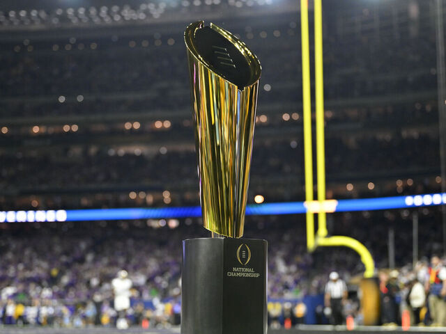 HOUSTON, TEXAS - JANUARY 08: A view of the The College Football Playoff National Championship Trophy during the 2024 CFP National Championship game between the Michigan Wolverines and the Washington Huskies at NRG Stadium on January 08, 2024 in Houston, Texas. The Michigan Wolverines won 34-13.