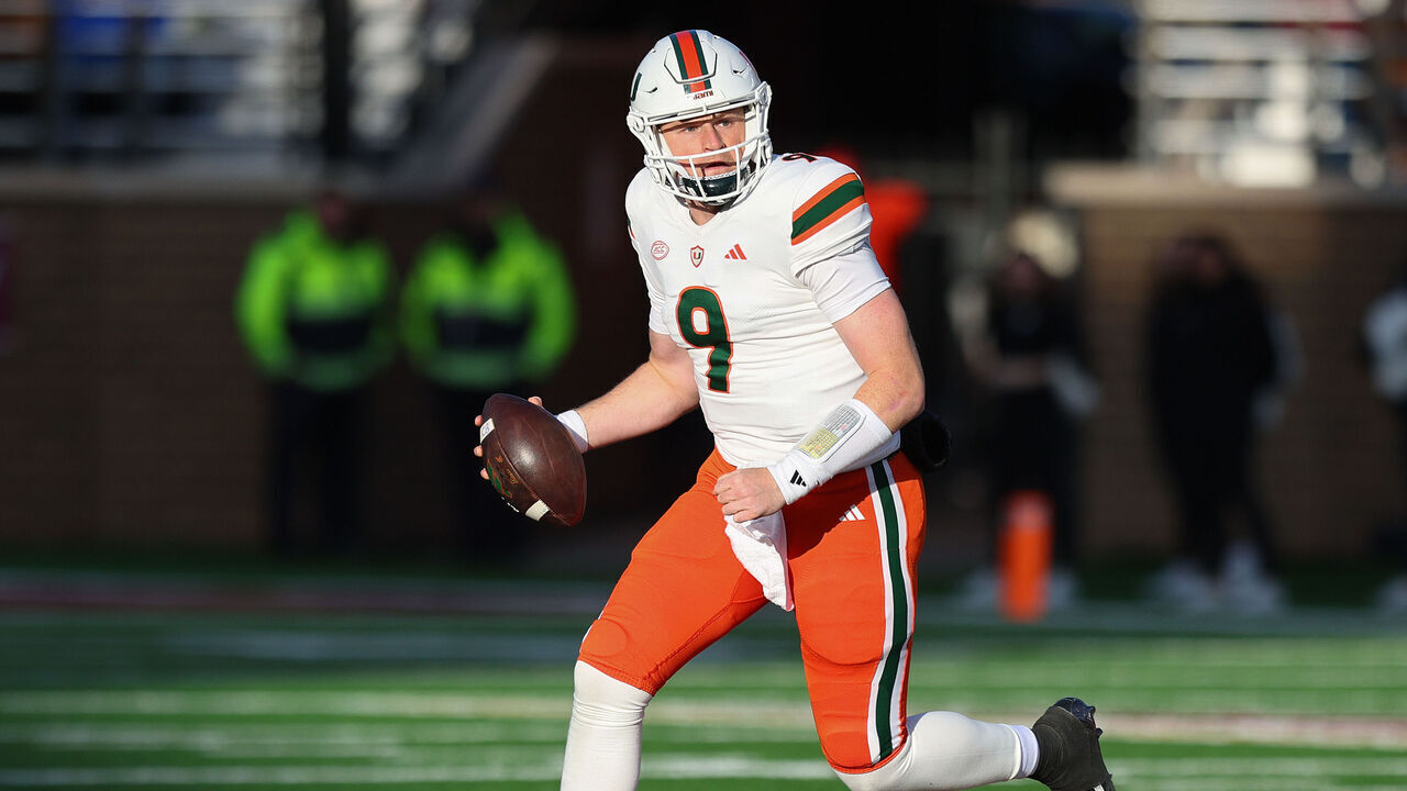 CHESTNUT HILL, MA - NOVEMBER 24: Miami Hurricanes quarterback Tyler Van Dyke (9) scrambles during the college football game between Miami Hurricanes and Boston College Eagles on November 24, 2023, at Alumni Stadium in Chestnut Hill, MA.
