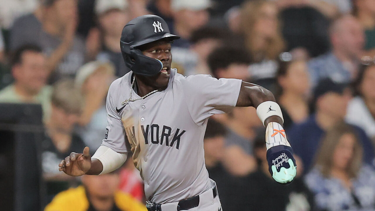 CHICAGO, IL - AUGUST 12: Jazz Chisholm Jr. #13 of the New York Yankees runs towards home plate during the fifth inning of a baseball game against the Chicago White Sox on August 12, 2024 at Guaranteed Rate Field in Chicago,Illinois.