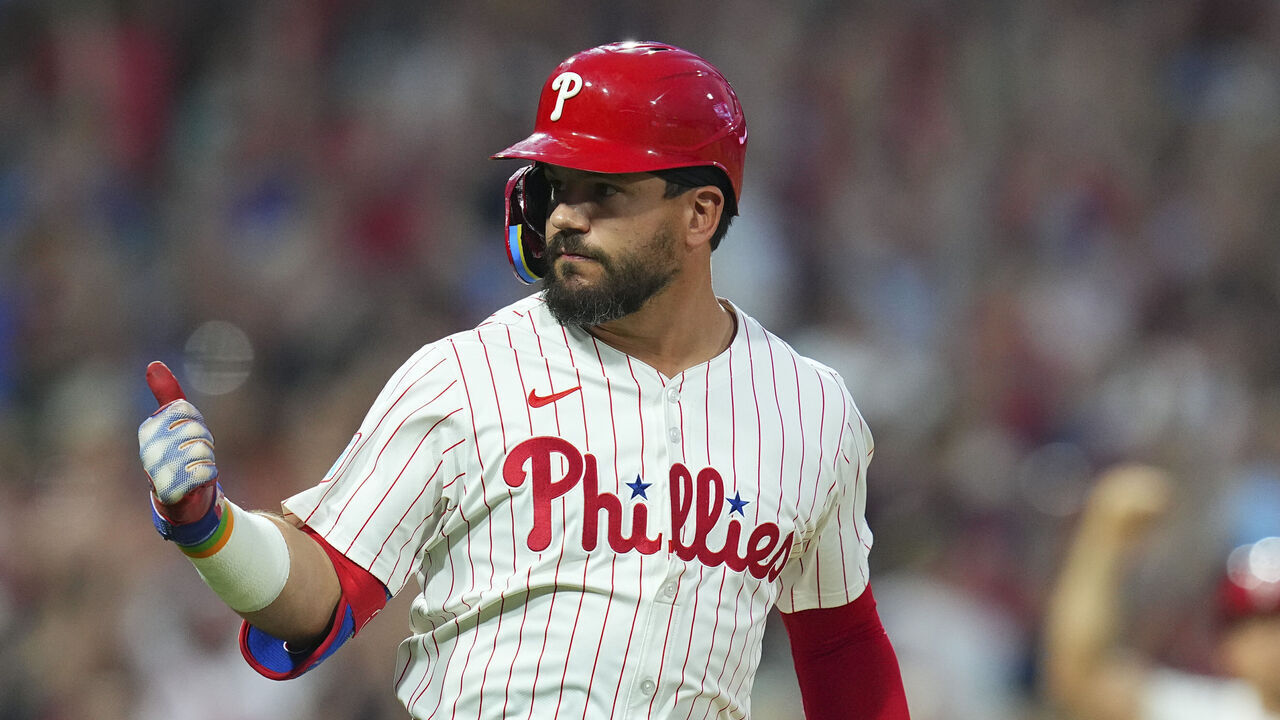 PHILADELPHIA, PENNSYLVANIA - AUGUST 14: Kyle Schwarber #12 of the Philadelphia Phillies celebrates his grand slam in the bottom of the fourth inning against the Miami Marlins at Citizens Bank Park on August 14, 2024 in Philadelphia, Pennsylvania.