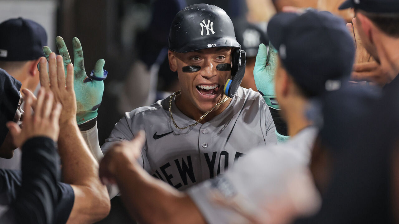 CHICAGO, IL - AUGUST 14: Aaron Judge #99 of the New York Yankees celebrates in the dugout after hitting his 300th home run of his career during the eight inning of a baseball game against the Chicago White Sox on August 14, 2024 at Guaranteed Rate Field in Chicago,Illinois.