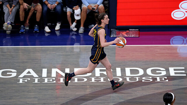 INDIANAPOLIS, IN - JULY 10: Indiana Fever guard Caitlin Clark (22) brings the ball up court against the Washington Mystics on July 10, 2024, at Gainbridge Fieldhouse in Indianapolis, Indiana.