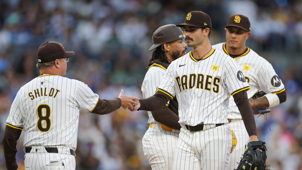 SAN DIEGO, CALIFORNIA - JULY 31: Manager Mike Shildt #8 of the San Diego Padres takes the ball from Dylan Cease #84 in a pitching change in the sixth inning during a game against the Los Angeles Dodgers at Petco Park on July 31, 2024 in San Diego, California.
