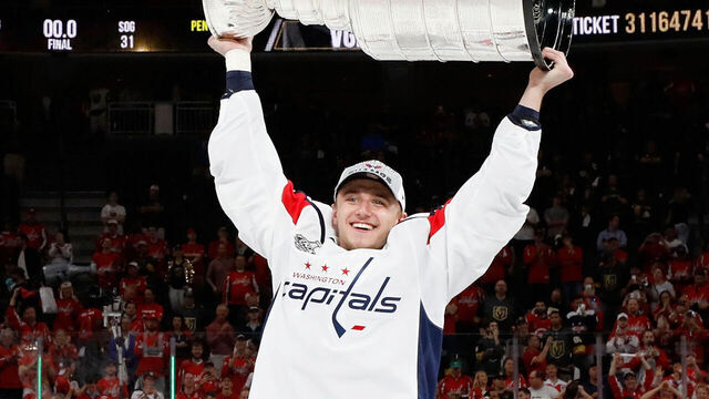 LAS VEGAS, NV - JUNE 07: Jakub Vrana #13 of the Washington Capitals lifts the Stanley Cup in celebration after his team defeated the Vegas Golden Knights 4-3 in Game Five of the 2018 NHL Stanley Cup Final at T-Mobile Arena on June 7, 2018 in Las Vegas, Nevada. The Capitals won the series four games to one.
