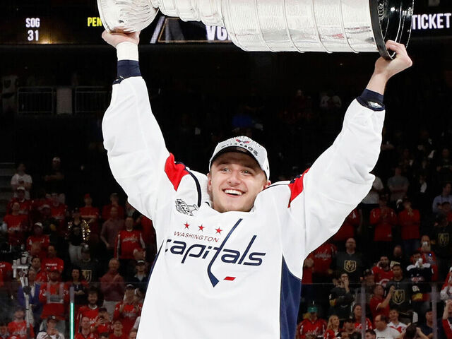 LAS VEGAS, NV - JUNE 07: Jakub Vrana #13 of the Washington Capitals lifts the Stanley Cup in celebration after his team defeated the Vegas Golden Knights 4-3 in Game Five of the 2018 NHL Stanley Cup Final at T-Mobile Arena on June 7, 2018 in Las Vegas, Nevada. The Capitals won the series four games to one.