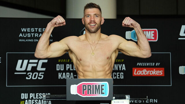 PERTH, AUSTRALIA - AUGUST 17: Dricus Du Plessis of South Africa poses on the scale during the UFC 305 official weigh-in at the Hyatt Regency Perth on August 17, 2024 in Perth, Australia.