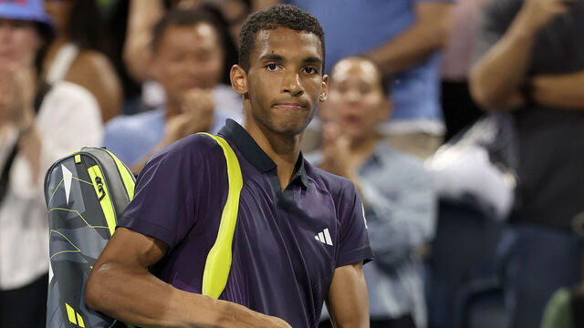 MASON, OHIO - AUGUST 16: Felix Auger-Aliassime of Canada leaves the court after losing to Jack Draper of Great Britain after a controversial match-ending point during Day 6 of the Cincinnati Open at the Lindner Family Tennis Center on August 16, 2024 in Mason, Ohio.