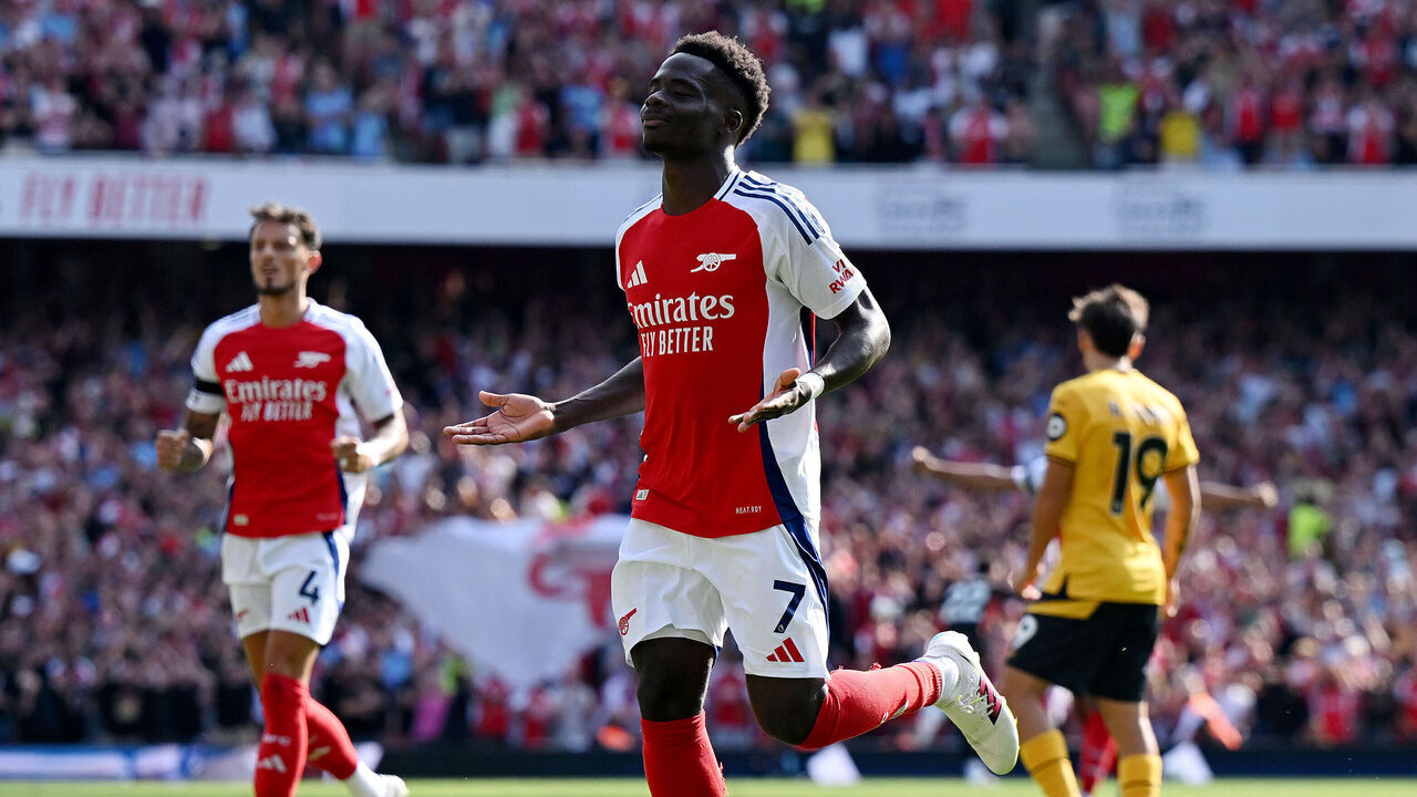 LONDON, ENGLAND - AUGUST 17: Bukayo Saka of Arsenal celebrates scoring his team's second goal during the Premier League match between Arsenal FC and Wolverhampton Wanderers FC at Emirates Stadium on August 17, 2024 in London, England.