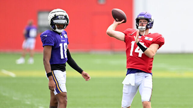 BEREA, OHIO - AUGUST 15: Sam Darnold #14 and Justin Jefferson #18 of the Minnesota Vikings run a drill during a joint training camp practice with the Cleveland Browns at CrossCountry Mortgage Campus on August 15, 2024 in Berea, Ohio.