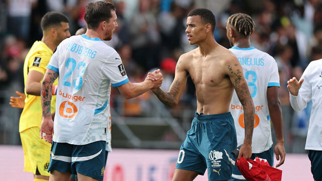 Marseille's English forward #10 Mason Greenwood shakes hands with Marseille's forward #23 Pierre Emil Kordt Hojbjerg at the end of the French L1 football match between Stade Brestois 29 (Brest) and Olympique Marseille (OM) at the Stade Francis-Le Ble in Brest, western France on August 17, 2024.