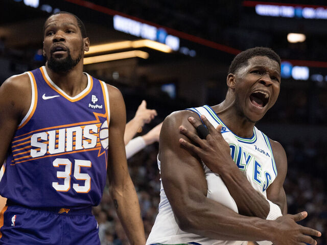 MINNEAPOLIS, MN. - APRIL 2024: Minnesota Timberwolves guard Anthony Edwards (5) reacted after a non-call on Phoenix Suns forward Kevin Durant (35) in the first quarter. The Minnesota Timberwolves faced the Phoenix Suns in an NBA basketball game Sunday afternoon, April 14, 2024 at Target Center in Minneapolis.