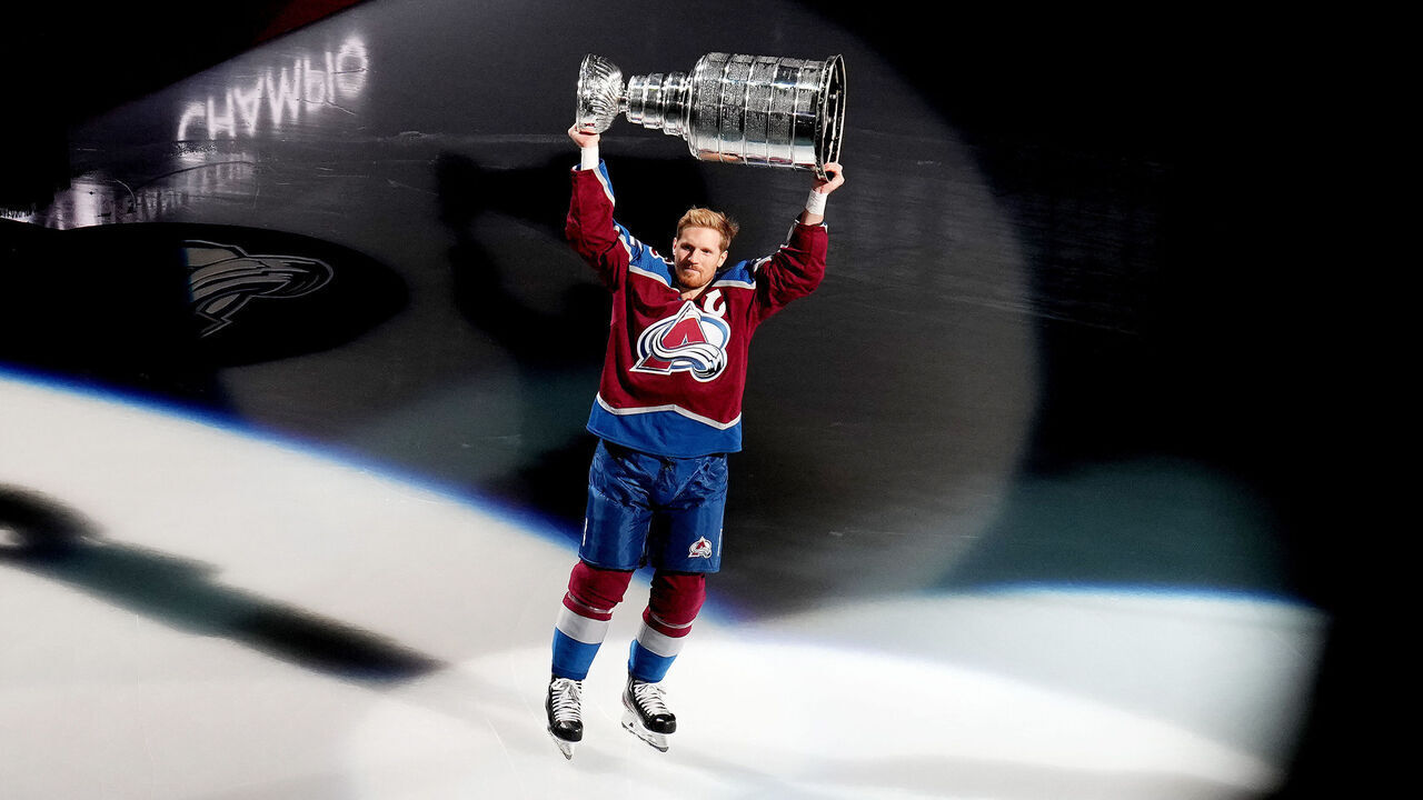 DENVER, COLORADO - OCTOBER 12: Gabriel Landeskog #92 of the Colorado Avalanche carries the Stanley Cup prior to the game against the Chicago Blackhawks at Ball Arena on October 12, 2022 in Denver, Colorado.