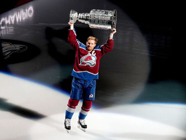 DENVER, COLORADO - OCTOBER 12: Gabriel Landeskog #92 of the Colorado Avalanche carries the Stanley Cup prior to the game against the Chicago Blackhawks at Ball Arena on October 12, 2022 in Denver, Colorado.