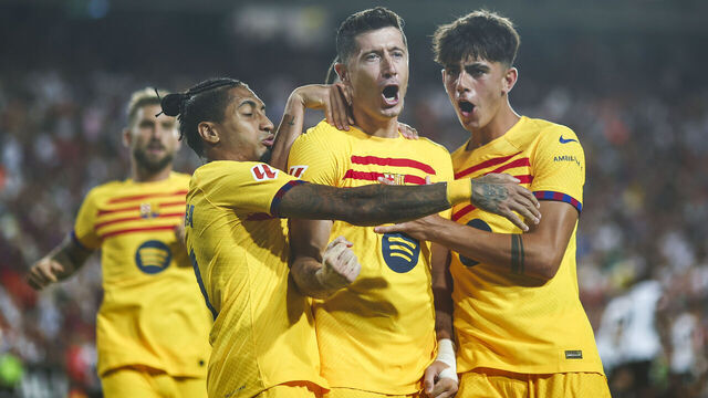 VALENCIA, SPAIN - AUGUST 17: Robert Lewandowski of FC Barcelona celebrates with his teammates after scoring the team's second goal during the La Liga match between Valencia CF and FC Barcelona at Estadio Mestalla on August 17, 2024 in Valencia, Spain.