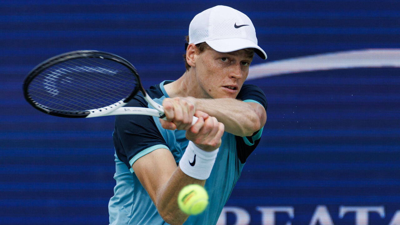 MASON, OHIO - AUGUST 17: Jannik Sinner of Italy hits a backhand against Andrey Rublev of Russia in the quarter finals of the Cincinnati Open at the Lindner Family Tennis Center on August 17, 2024 in Mason, Ohio.
