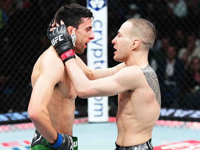 PERTH, AUSTRALIA - AUGUST 18: (R-L) Kai Kara-France of New Zealand and Steve Erceg of Australia talk after a flyweight fight during the UFC 305 event at RAC Arena on August 18, 2024 in Perth, Australia.