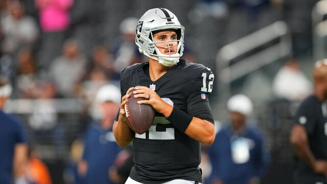 LAS VEGAS, NEVADA - AUGUST 17: Quarterback Aidan O'Connell #12 of the Las Vegas Raiders warms up before a preseason game against the Dallas Cowboys at Allegiant Stadium on August 17, 2024 in Las Vegas, Nevada.
