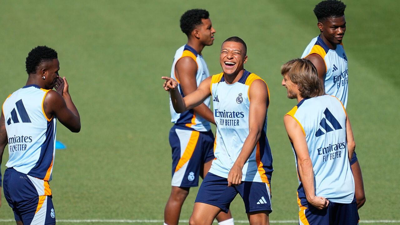 MADRID, SPAIN - AUGUST 17: Kylian Mbappe smiles during a Real Madrid training session ahead the first match of LaLiga EA Sports against RCD Mallorca at Ciudad Deportiva Real Madrid on August 17, 2024 in Madrid, Spain.