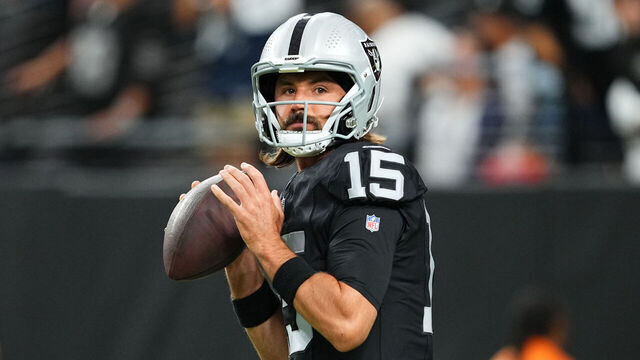 LAS VEGAS, NEVADA - AUGUST 17: Quarterback Gardner Minshew #15 of the Las Vegas Raiders warms up before a preseason game against the Dallas Cowboys at Allegiant Stadium on August 17, 2024 in Las Vegas, Nevada.