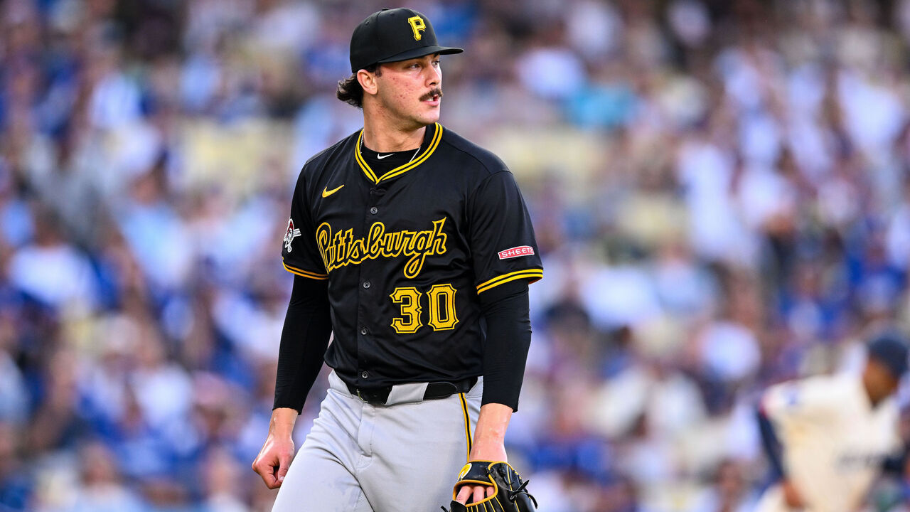 LOS ANGELES, CALIFORNIA - AUGUST 10: Paul Skenes #30 reacts after pitching in the bottom of the first inning during the regular season game against the Los Angeles Dodgers at Dodger Stadium on August 10, 2024 in Los Angeles, California.