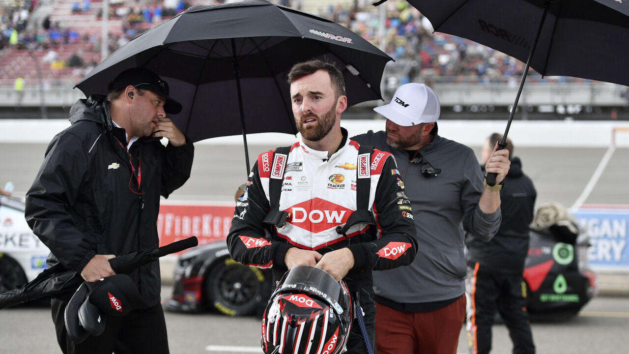 BROOKLYN, MICHIGAN - AUGUST 18: Austin Dillon, driver of the #3 DOW MobilityScience Chevrolet, exits his car after the weather cancelation of the NASCAR Cup Series FireKeepers Casino 400 at Michigan International Speedway on August 18, 2024 in Brooklyn, Michigan.