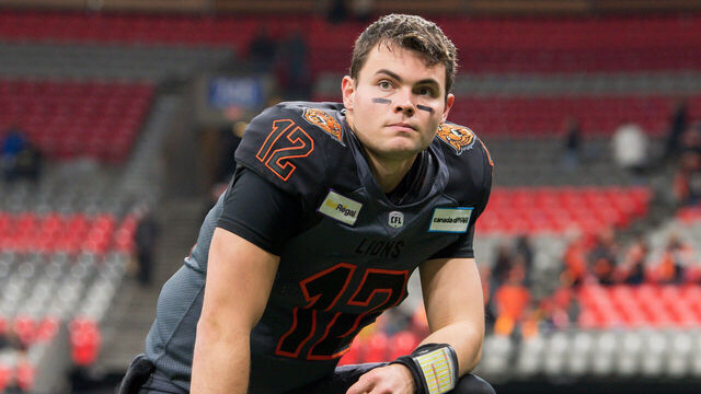 VANCOUVER, BC - NOVEMBER 06: B.C. Lions quarterback Nathan Rourke (12) takes a knee after defeating the Calgary Stampeders in their CFL Western Semi-Final game on November 6, 2022 at BC Place in Vancouver, BC.