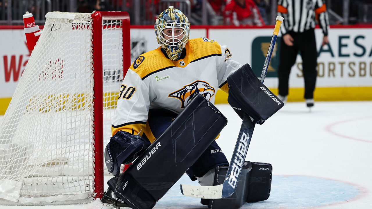 WASHINGTON, DC - DECEMBER 30: Yaroslav Askarov #30 of the Nashville Predators tends net against the Washington Capitals during overtime in the game at Capital One Arena on December 30, 2023 in Washington, DC.