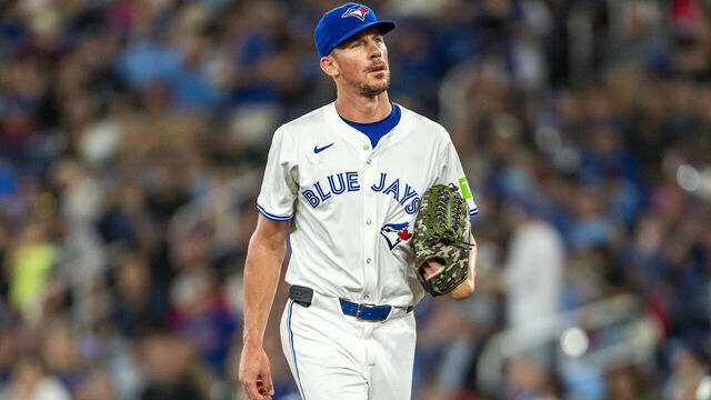 TORONTO, CANADA - AUGUST 11: Chris Bassitt #40 of the Toronto Blue Jays looks on against the Oakland Athletics at their MLB game at Rogers Centre on August 11, 2024 in Toronto, Canada.