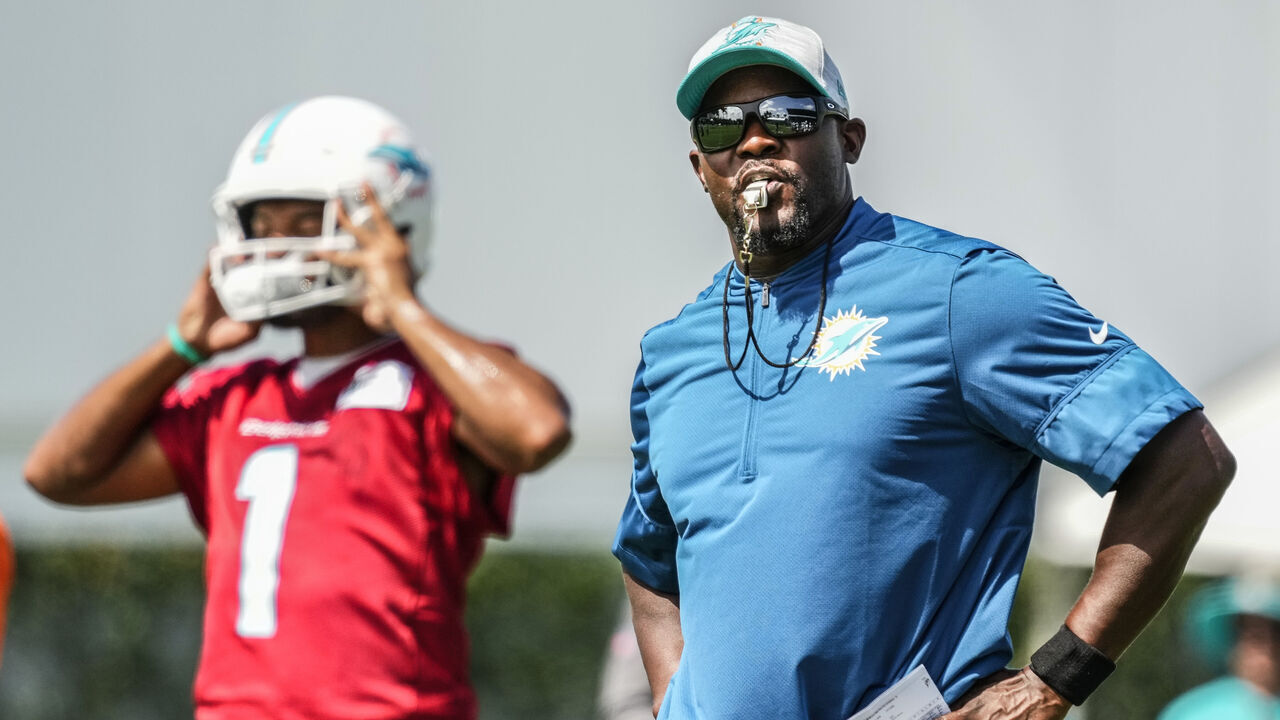 MIAMI GARDENS, FLORIDA - JULY 31: Head Coach Brian Flores of the Miami Dolphins giving instructions for practice drills during Training Camp at Baptist Health Training Complex on July 31, 2021 in Miami Gardens, Florida.
