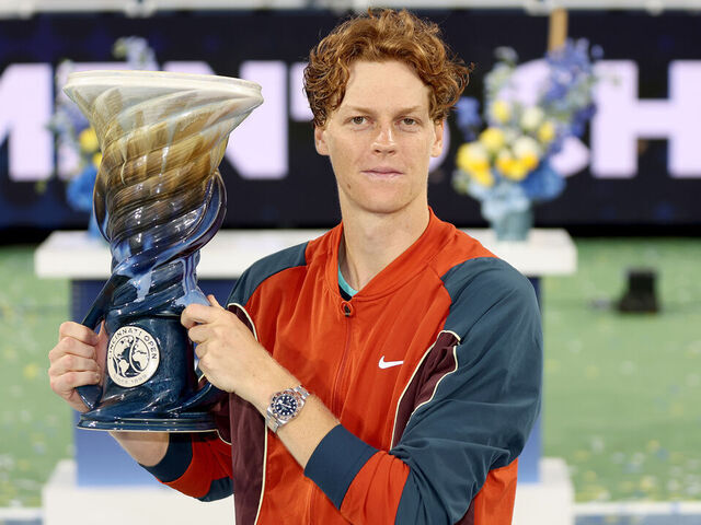 MASON, OHIO - AUGUST 19: Jannik Sinner of Italy poses with the Rookwood Cup after defeating Frances Tiafoe of the United States during the men's final of the Cincinnati Open at the Lindner Family Tennis Center on August 19, 2024 in Mason, Ohio.