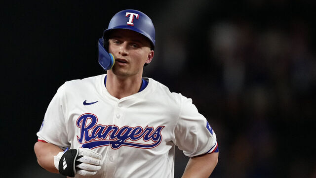 ARLINGTON, TEXAS - AUGUST 19: Corey Seager #5 of the Texas Rangers runs the bases after hitting a solo home run during the first inning against the Pittsburgh Pirates at Globe Life Field on August 19, 2024 in Arlington, Texas.